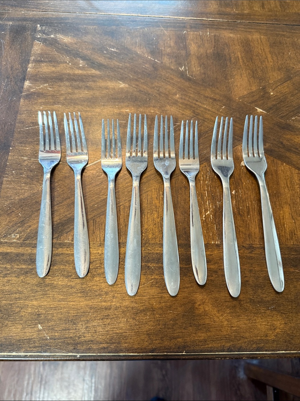 Stainless Steel Dinner Forks in Silver - Set of 8 in good used condition